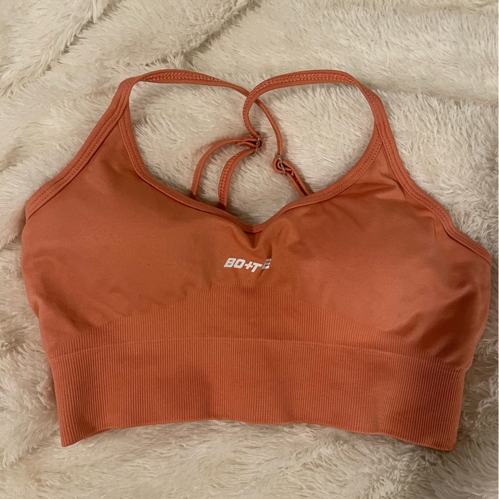 Orange Bo + Tee racer back sports bra